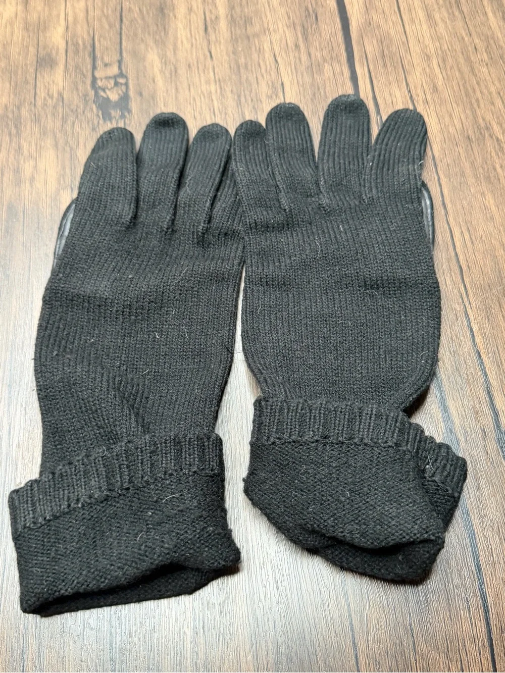 Vintage long black knit gloves featuring a textured cuff